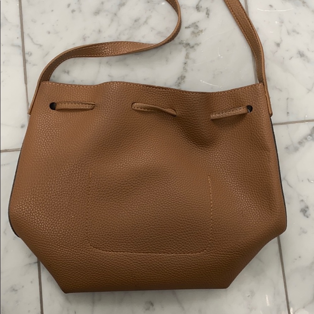 Navy and tan vegan leather cross body bag. - Picture 3 of 5